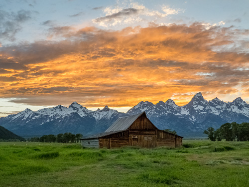 [© Mormon Row Barn and Tetons by Amory B. Lovins is described with Fine Art, Stock, Grand Teton National Park, Sunset, Horizontal, Barn, Grand Tetons, Mountains, Mormon Row, Clouds, orange, grey, green, blue, snow, Rocky Mountains, retro hit 33111 rate ]