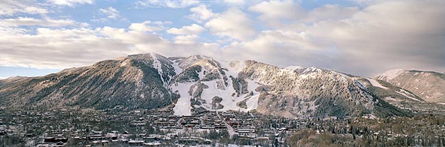 [© Aspen Mountain, 2002 by Judy Hill is described with Fine Art, Color, Neutrals, Cool, Mountain, Town, Winter, Panorama, Horizontal, White, Gray, Blue, Beige, Silver, Ajax, Aspen, Aspen Mountain, Colorado, Roaring Fork Valley, Rocky Mountain, Rockys, Ski Area, White River National Forest, Air, Blue sky, Clouds, Cloudy, Mt., Peak, sky, Snowy, Snow, City, Buildings, Historic, Old Buildings, Stock, Sunrise hit 13424 rate ]